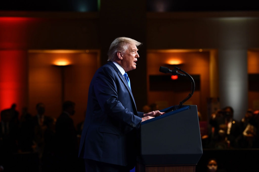 President Donald Trump made a surprise in-person visit to the Republican National Convention shortly after they officially nominated for president Aug. 24, 2020. The pared-down convention is still taking place in Charlotte, N.C. but without the large presence as previously planned. CREDIT: Brendan Smialowski/AFP via Getty Images