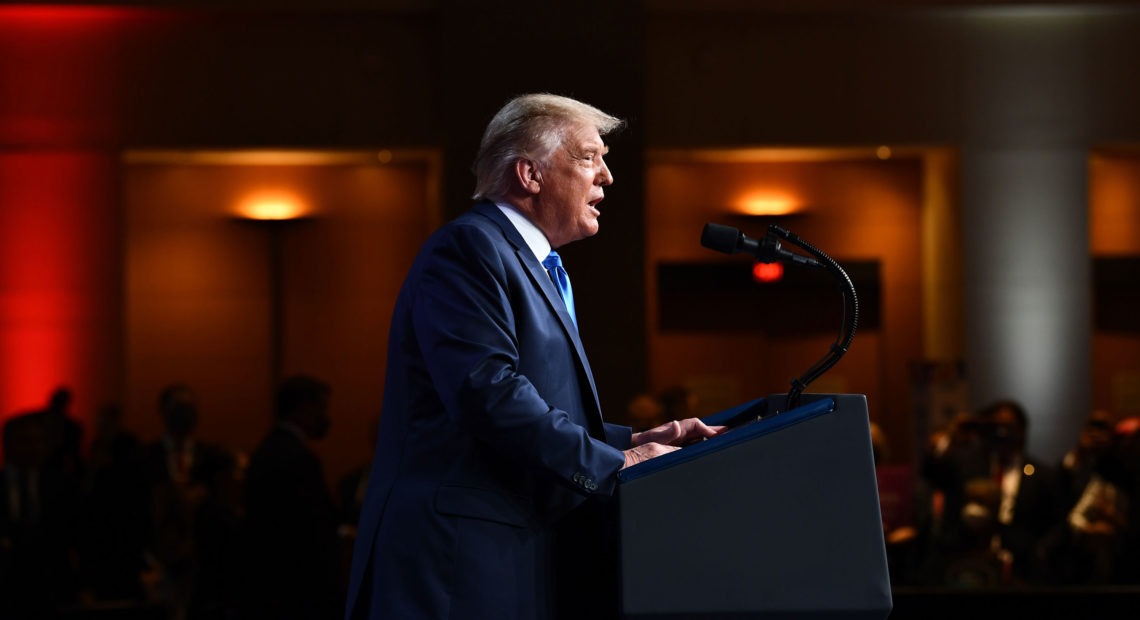 President Donald Trump made a surprise in-person visit to the Republican National Convention shortly after they officially nominated for president Aug. 24, 2020. The pared-down convention is still taking place in Charlotte, N.C. but without the large presence as previously planned. CREDIT: Brendan Smialowski/AFP via Getty Images