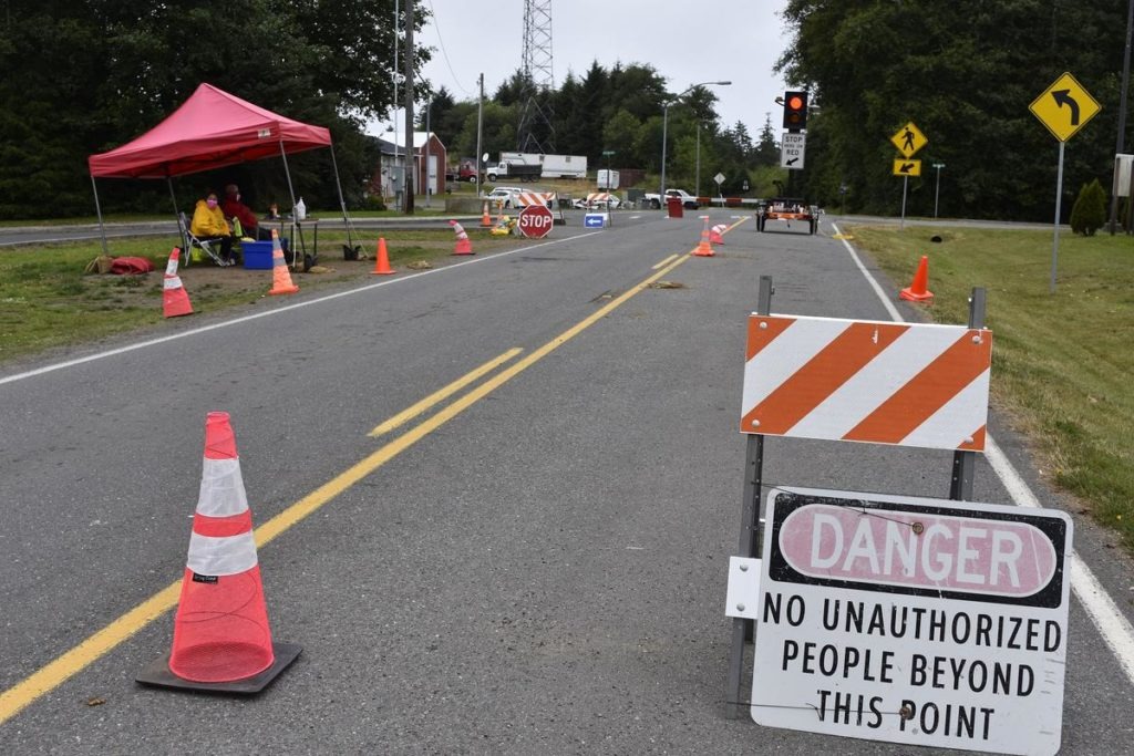 A security checkpoint on the road into the Quileute community of La Push enforces the temporary closure of tribal lands to visitors. CREDIT: Emily Foster