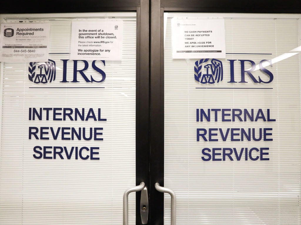 Employers are supposed to stop withholding the payroll tax on Sept. 1. But companies need guidance from the IRS on exactly who is eligible to have their taxes suspended and how to keep track so those taxes can eventually be repaid. CREDIT: Elaine Thompson/AP