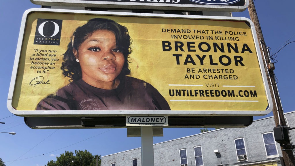 A billboard with a photo of Breonna Taylor, sponsored by O, The Oprah Magazine, is on display on Friday in Louisville, Ky. It's one of 26 billboards going up across the city demanding arrests in her shooting death. CREDIT: Dylan T. Lovan/AP