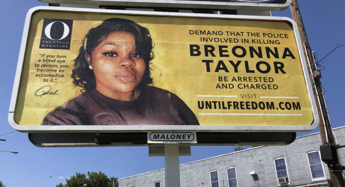 A billboard with a photo of Breonna Taylor, sponsored by O, The Oprah Magazine, is on display on Friday in Louisville, Ky. It's one of 26 billboards going up across the city demanding arrests in her shooting death. CREDIT: Dylan T. Lovan/AP