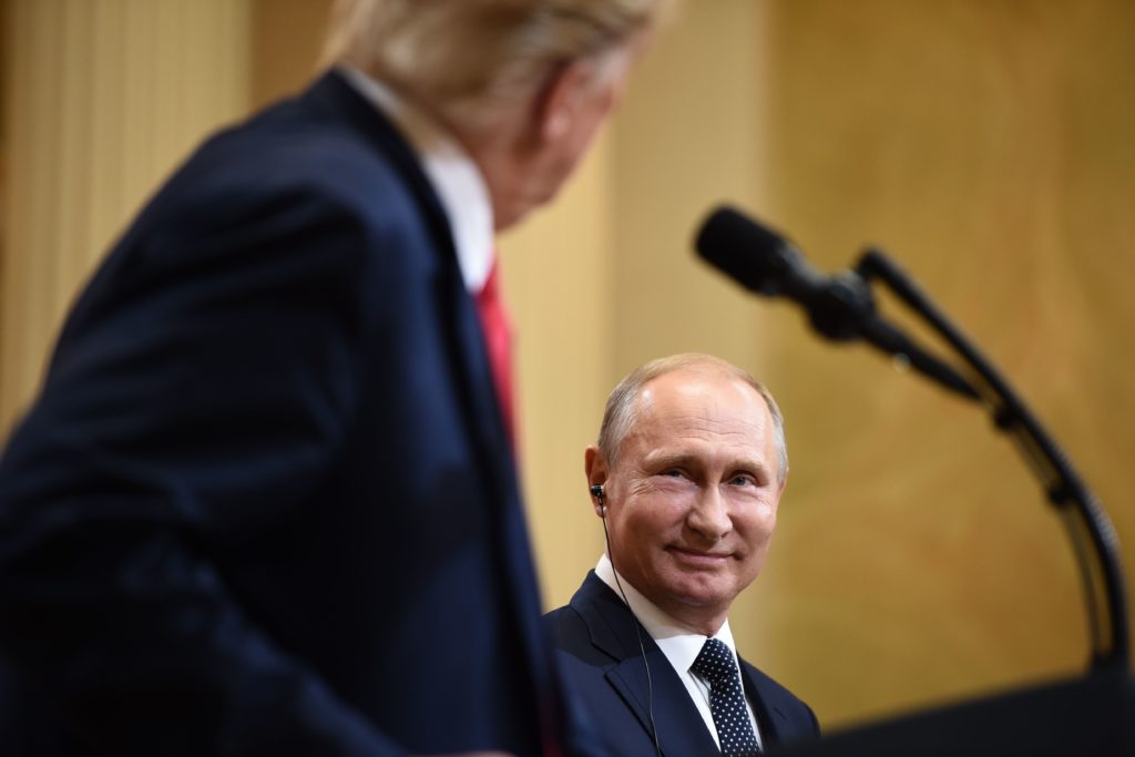 President Trump and Russian President Vladimir Putin attend a joint press conference after a July 2018 meeting in Helsinki. CREDIT: Brendan Smialowski/AFP via Getty Images