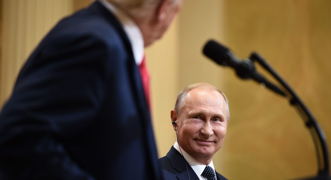 President Trump and Russian President Vladimir Putin attend a joint press conference after a July 2018 meeting in Helsinki. CREDIT: Brendan Smialowski/AFP via Getty Images
