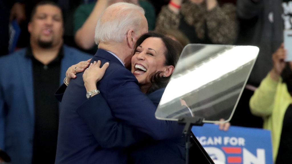 Biden and Harris hug after she endorsed and introduced him at a March 9 campaign rally in Detroit. CREDIT: Scott Olson/Getty Images