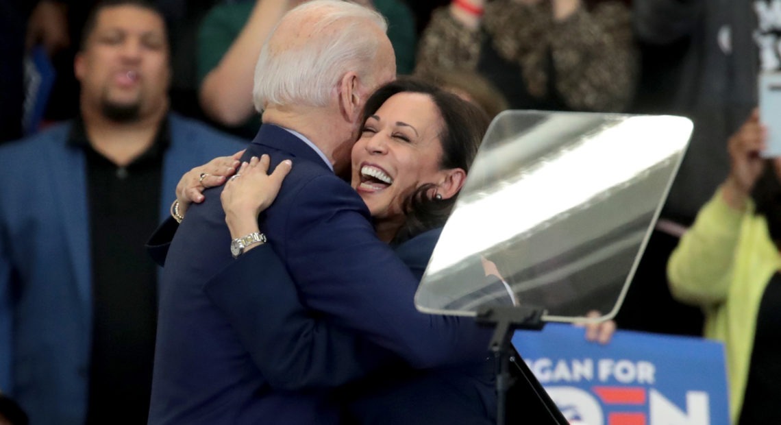 Biden and Harris hug after she endorsed and introduced him at a March 9 campaign rally in Detroit. CREDIT: Scott Olson/Getty Images