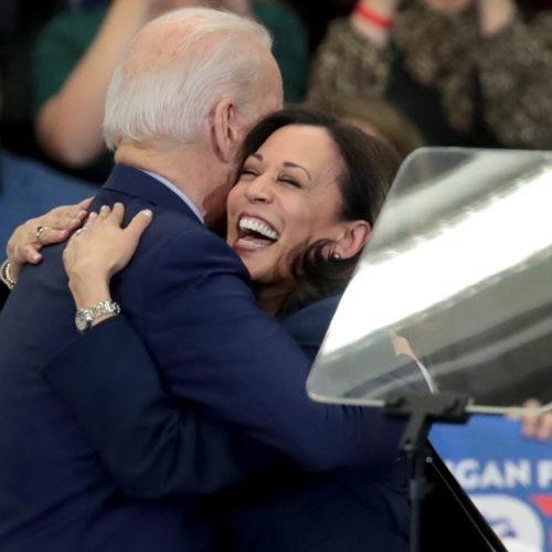 Biden and Harris hug after she endorsed and introduced him at a March 9 campaign rally in Detroit. CREDIT: Scott Olson/Getty Images