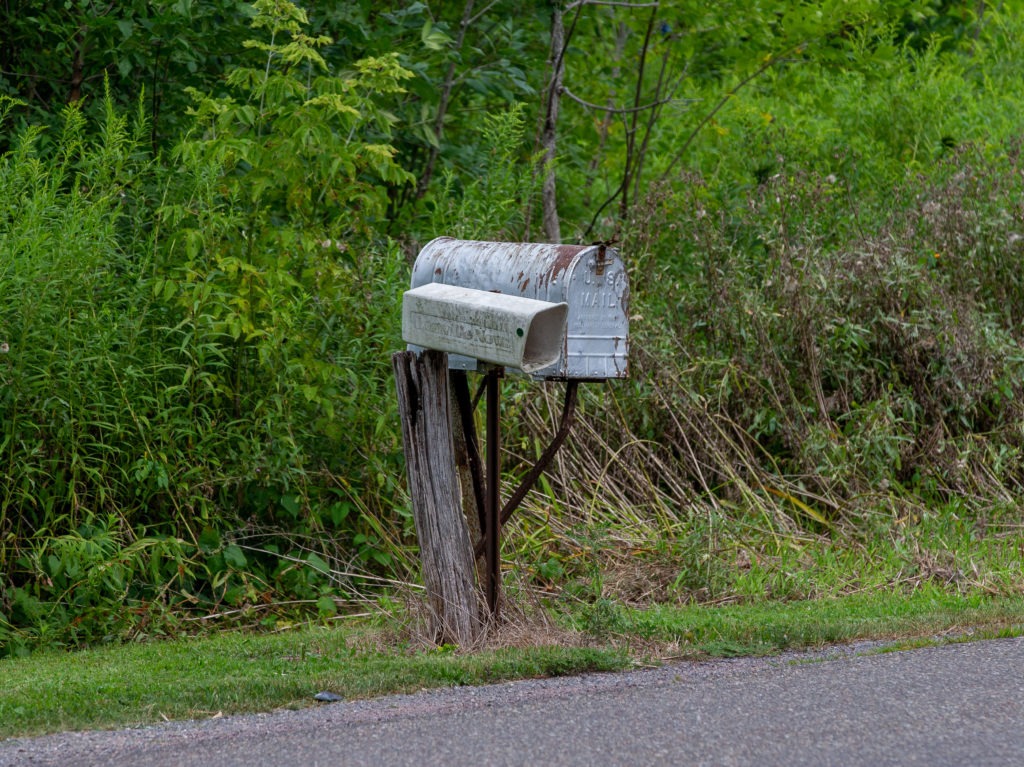 The U.S. Postal Service warned states in late July that it might not be able to deliver mail-in ballots in time to be counted. Amid a growing outcry from rural leaders, the agency's director has backed down from planned broad cuts and changes. CREDIT: aul Weaver/Pacific Press/LightRocket via Getty Images