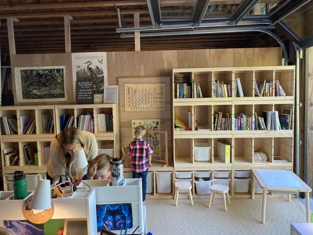 A few Ikea shelves and desks, rugs and a temporary plywood wall is what it took for the Swanson family to turn their garage into a classroom for four of their six children, plus two foster children.