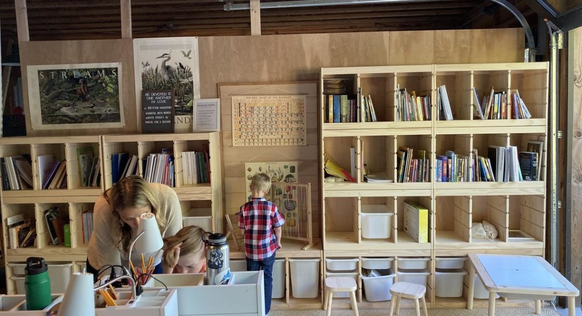 A few Ikea shelves and desks, rugs and a temporary plywood wall is what it took for the Swanson family to turn their garage into a classroom for four of their six children, plus two foster children.