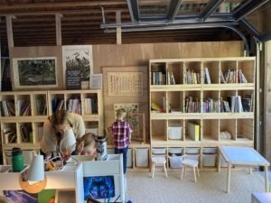 A few Ikea shelves and desks, rugs and a temporary plywood wall is what it took for the Swanson family to turn their garage into a classroom for four of their six children, plus two foster children.
