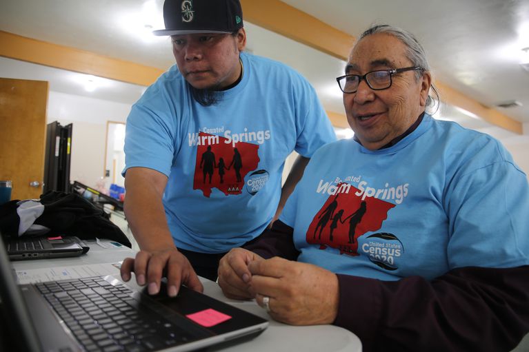 Louie Pitt, seated, fills out a census form online in Warm Springs, March 12, 2020. CREDIT: Emily Cureton / OPB
