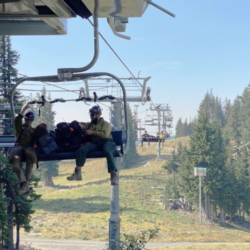 Fire crews rode an express chairlift at Mount Hood Meadows to more easily reach a fire burning in the ski area's expert-level terrain on Sept. 7, 2020.