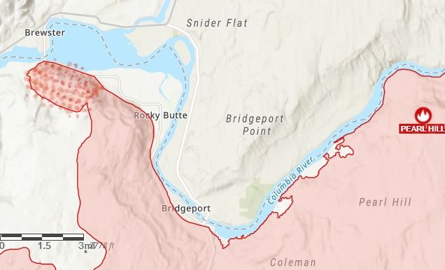 Residents and farmworkers around Brideport (lower, center) evacuated to Brewster as the Pearl Hill Fire swept through the Douglas County area on the south-side of the Columbia River. Across the river, the Cold Springs Fire also burned in Okanogan County. CREDIT: ArcGIS Wildfire Map/Screenshot