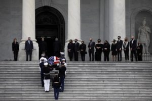 The flag-draped coffin of the late Supreme Court Justice Ruth Bader Ginsburg arrives to the U.S. Capitol where she will lie in state for two hours in Washington, D.C. Cheryl Diaz Meyer for NPR
