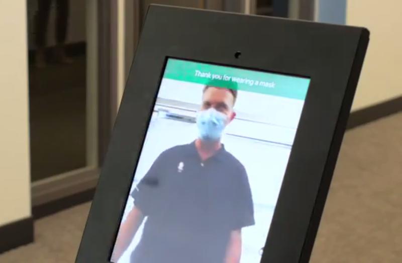 Screen grab from a Nomad Go demo video showing a kiosk that monitors mask compliance at a building entry. CREDIT: Nomad Go