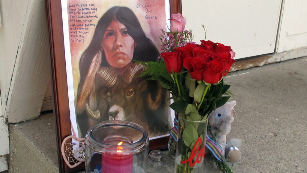 A memorial to Savanna LaFontaine-Greywind outside the apartment where Greywind lived with her parents in Fargo, N.D., pictured in 2017. Savanna's Act requires the Department of Justice to strengthen training, coordination and data collection in cases of murdered or missing Native Americans. Dave Kolpack/AP