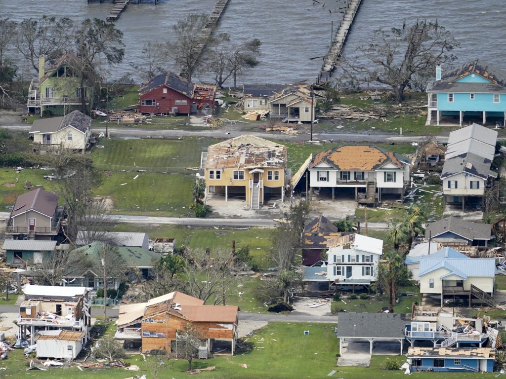 Hurricane Laura left scattered debris and damaged homes in Lake Charles, La. last week. The state has reported 15 deaths associated with the storm, with more than half of those attributed to improper use of portable generators. CREDIT: David J. Phillip/AP