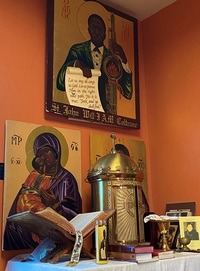 Byzantine-style icons, including ones of John Coltrane, the Virgin Mary and Jesus at the Coltrane-devoted church. CREDIT: Anastasia Tsioulcas/NPR