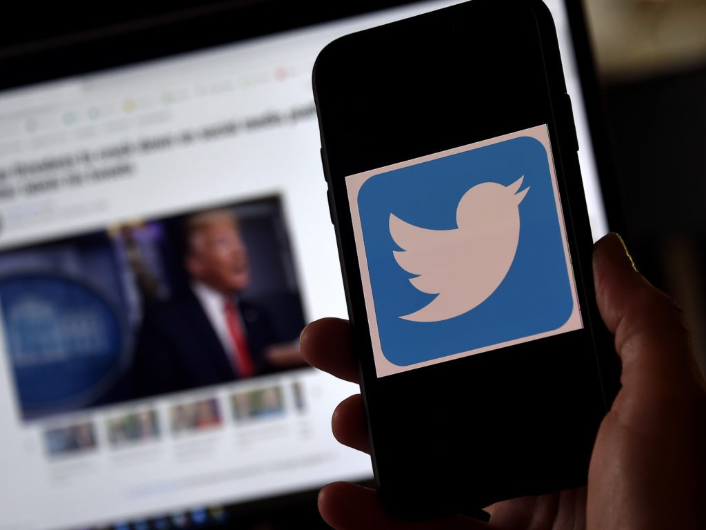 Twitter says it will crack down on attempts to undermine faith in the November election or incite unrest. CREDIT: Olivier Douliery/AFP via Getty Images
