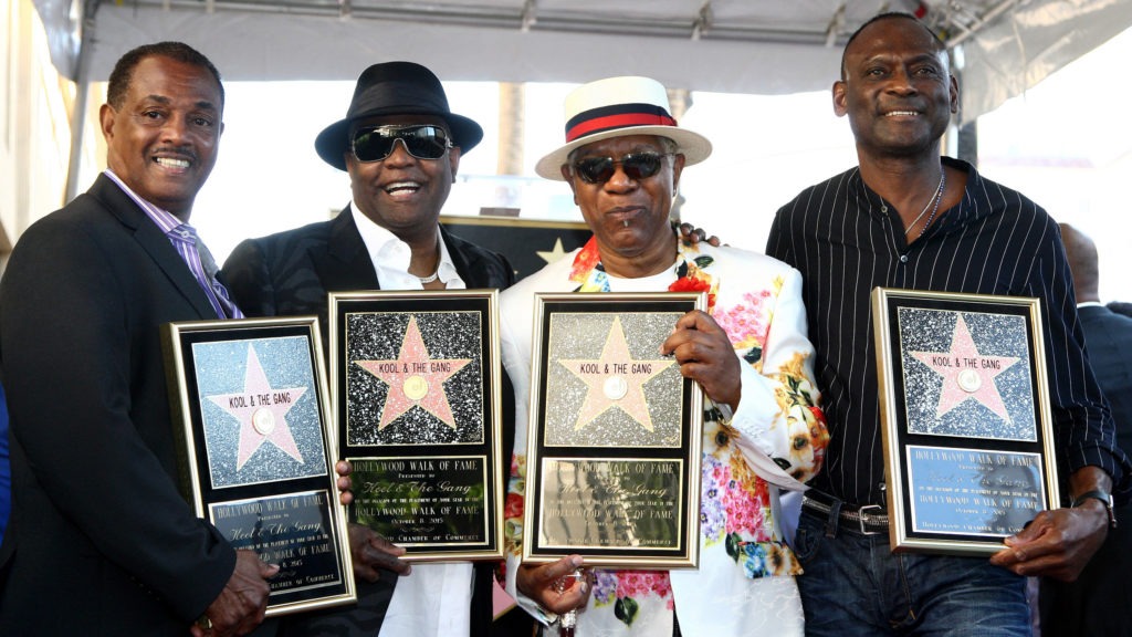 From left: Robert "Kool" Bell, Ronald "Khalis" Bell, Dennis "Dee Tee" Thomas and George Brown of Kool & The Gang, receiving a star on the Hollywood Walk of Fame on Oct. 8, 2015. Tommaso Boddi/WireImage