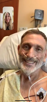 Don Ramsayer and his sister Melanie Ramsayer speak over FaceTime on August 30. He'd been off the ventilator for 10 days and was finally recovered enough from COVID-19 to be moved out of the ICU. Don and Melanie Ramsayer