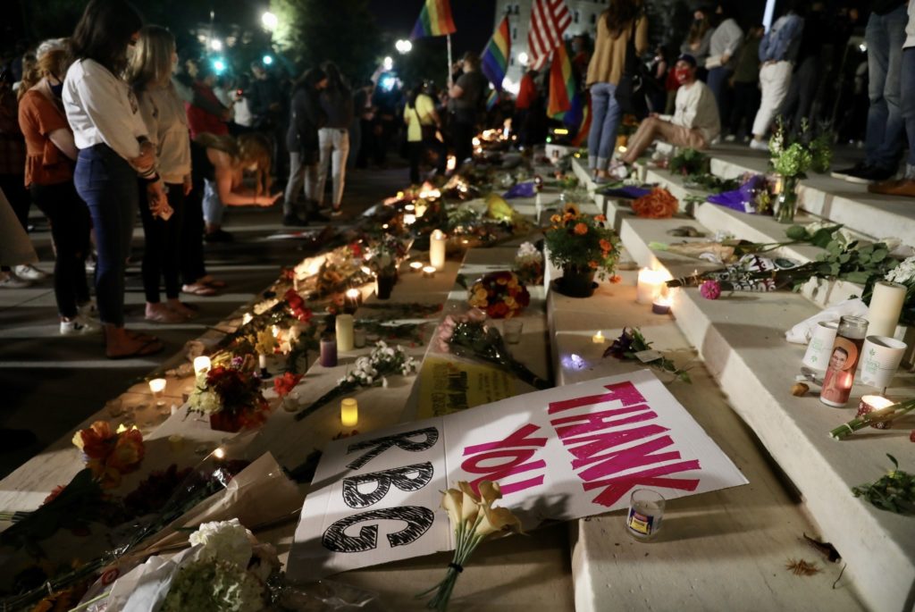 A crowd gathers at the U.S. Supreme Court to mourn the death of Supreme Court Justice Ruth Bader Ginsburg on Friday, Sept. 18. CREDIT: Tyrone Turner/WAMU