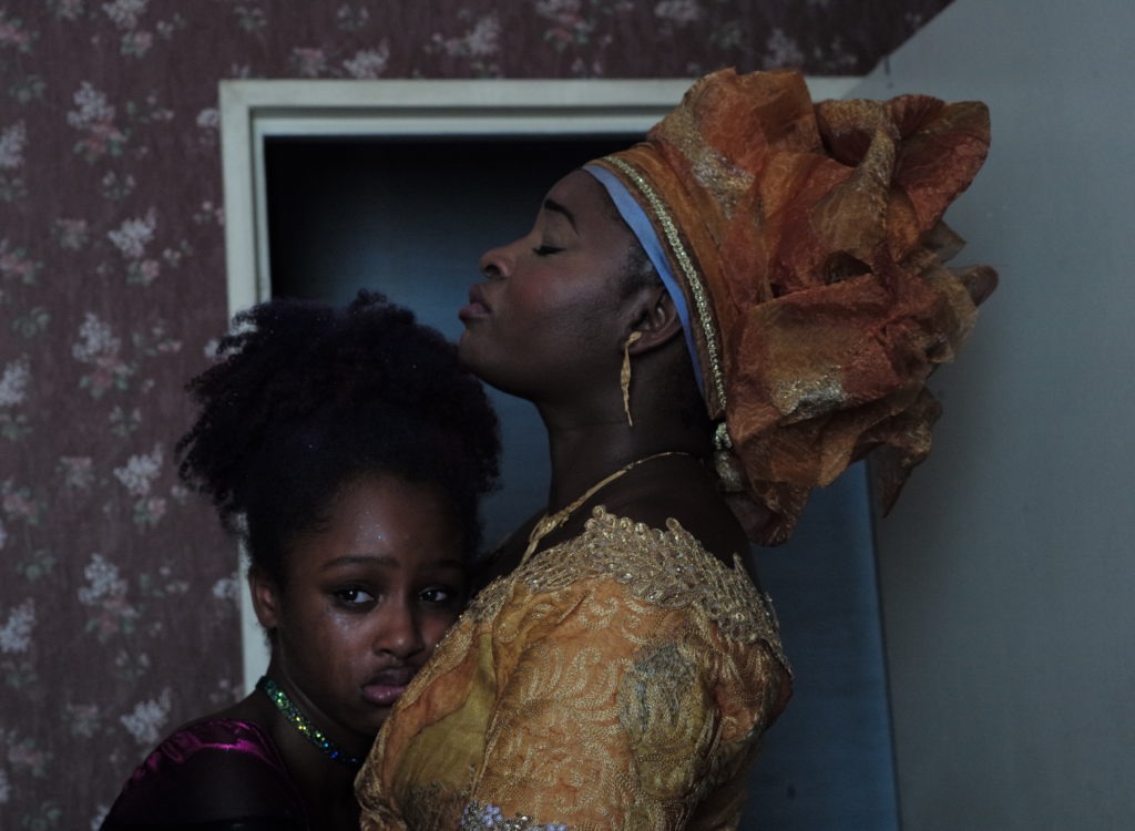 Amy (left), played by Fathia Youssouf, and her mother Mariam, played by Maïmouna Gueye, in a still from the film, Cuties. CREDIT: Jean-Michel Papazian/Netflix