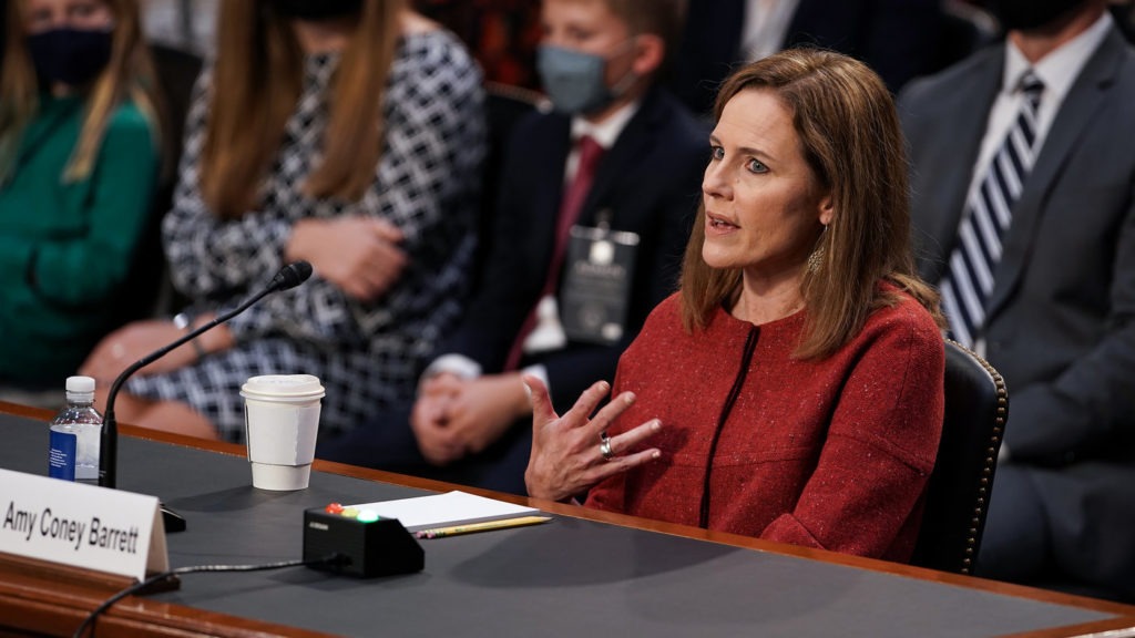 President Trump's Supreme Court nominee Judge Amy Coney Barrett testifies during the second day of her Senate Judiciary confirmation hearing on Tuesday. Greg Nash/Pool/Getty Images