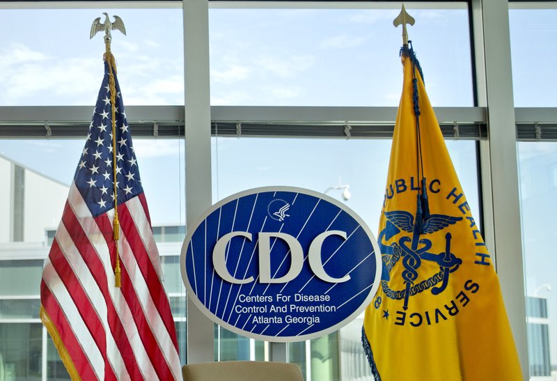 The Centers for Disease Control and Prevention logo at the agency's federal headquarters in Atlanta. Reacting to a Friday, Dec. 15, 2017 story in The Washington Post, health leaders said they were alarmed that officials at the CDC, the nation's top public health agency, were told not to use certain words or phrases in official budget documents, including "fetus," ''transgender" and "science-based." CREDIT: David Goldman/AP