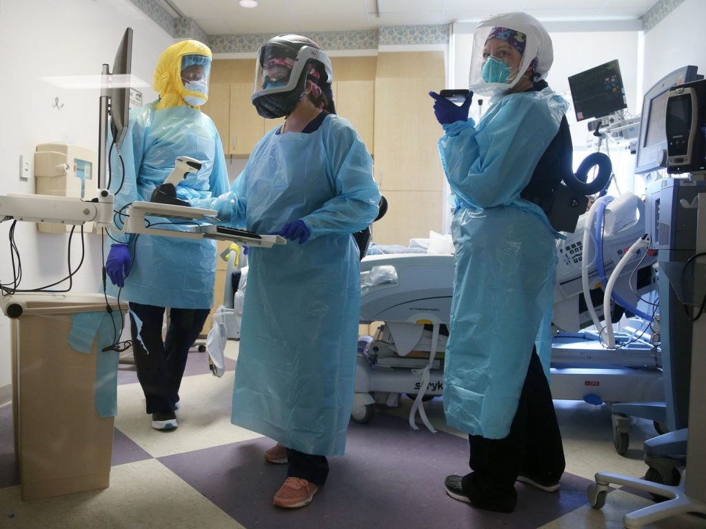 COVID-19 mortality rates are going down, according to studies of two large hospital systems, partly thanks to improvements in treatment. Here, clinicians care for a patient in July at an El Centro, Calif., hospital. CREDIT: Mario Tama/Getty Images