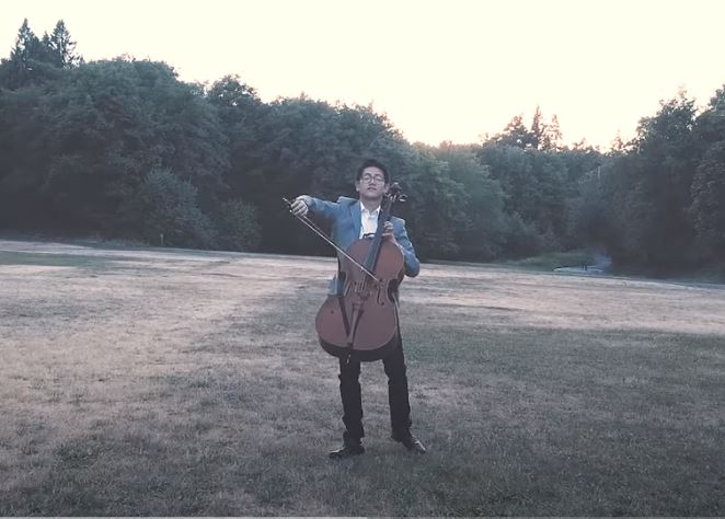 Seattle Symphony cellist Nathan Chan, shown here in a still image from a video cover of the song "Down" on his YouTube channel, uses social media channels to connect with younger audiences and share his musical insights. CREDIT: Nathan Chan/YouTube/Screenshot by NWPB