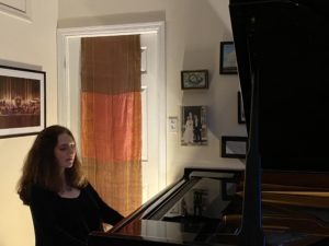 Dinnerstein at her home piano