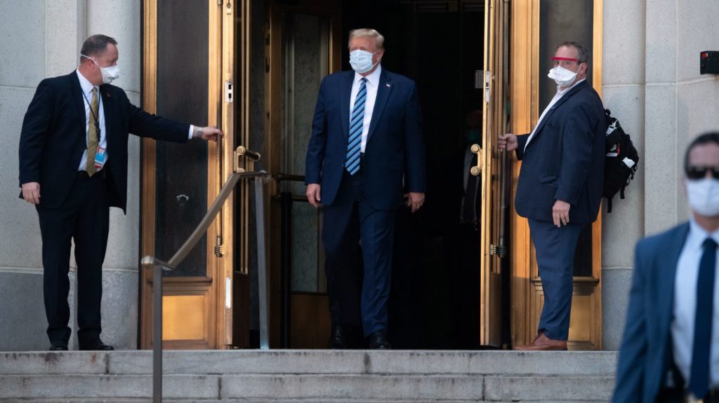 President Trump walks out of Walter Reed National Military Medical Center in Bethesda, Md., on Monday evening before heading back to the White House. Saul Loeb/AFP via Getty Images