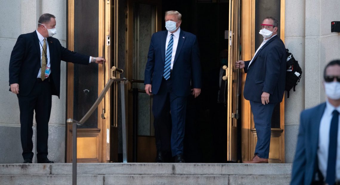 President Trump walks out of Walter Reed National Military Medical Center in Bethesda, Md., on Monday evening before heading back to the White House. Saul Loeb/AFP via Getty Images