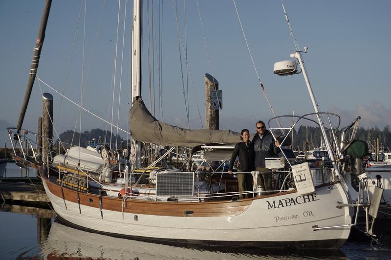 Sarah Laidlaw and Rob Martin are sailing around the world on the 38-foot cruiser Mapache, seen here before departure at the Port of Ilwaco, Washington.
