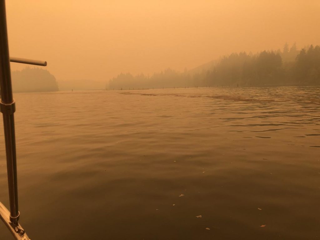 The round-the-world sailors took shelter from storm winds in Yaquina Bay near Newport, Oregon, where thick wildfire smoke subsequently made navigation difficult in mid-September. CREDIT: Sarah Laidlaw