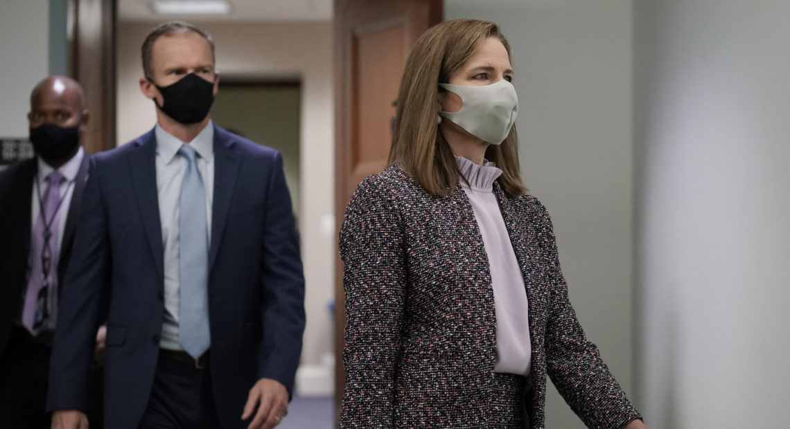 Supreme Court nominee Amy Coney Barrett arrives Wednesday for the third day of her confirmation hearing with the Senate Judiciary Committee. CREDIT: J. Scott Applewhite/AP