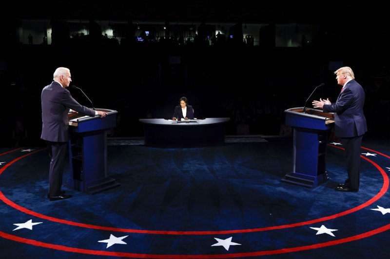 President Donald Trump and Democratic presidential candidate former Vice President Joe Biden participate in the final presidential debate at Belmont University, Thursday, Oct. 22, 2020, in Nashville, Tenn. CREDIT: Jim Bourg/Pool via AP