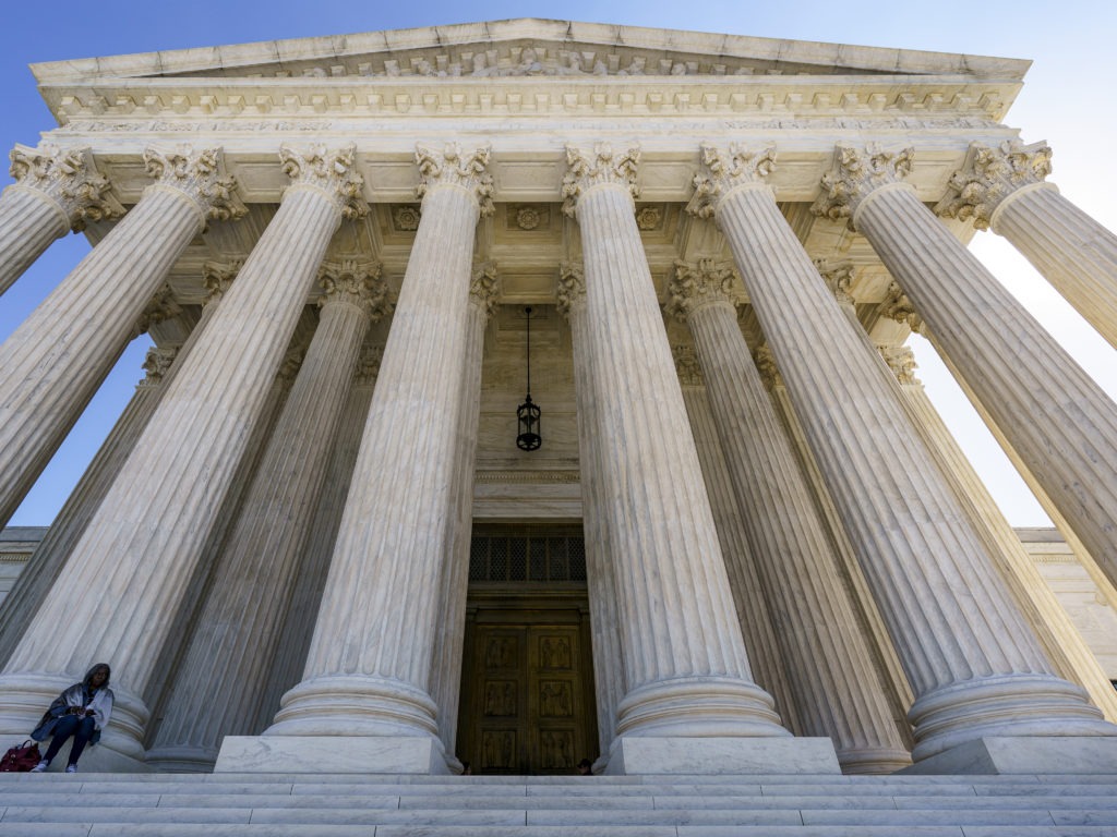 The Supreme Court is seen in Washington, Wednesday morning, Oct. 7, 2020. President Donald Trump's nominee to the high court, Judge Amy Coney Barrett, is scheduled to face the Senate Judiciary Committee next Monday, Oct. 12, 2020. CREDIT: Scott Applewhite/AP