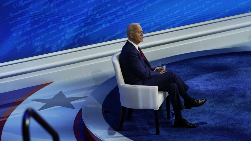 Biden pauses before the start of a town hall with moderator ABC News anchor George Stephanopoulos at the National Constitution Center in Philadelphia on Thursday. Carolyn Kaster/AP