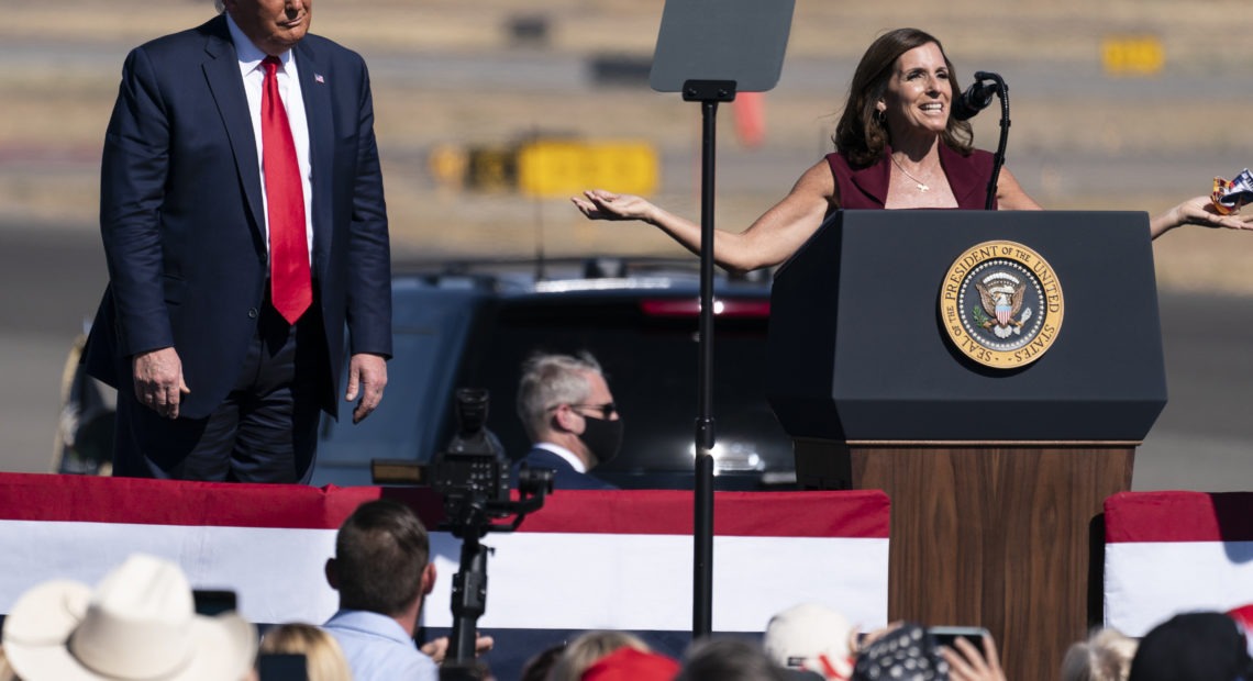 President Trump campaigned with Sen. Martha McSally, R-Ariz., in Prescott, Ariz., this month. McSally is a top target of Senate Democrats, who are hoping to flip her seat blue on Election Day. CREDIT: Alex Brandon/AP