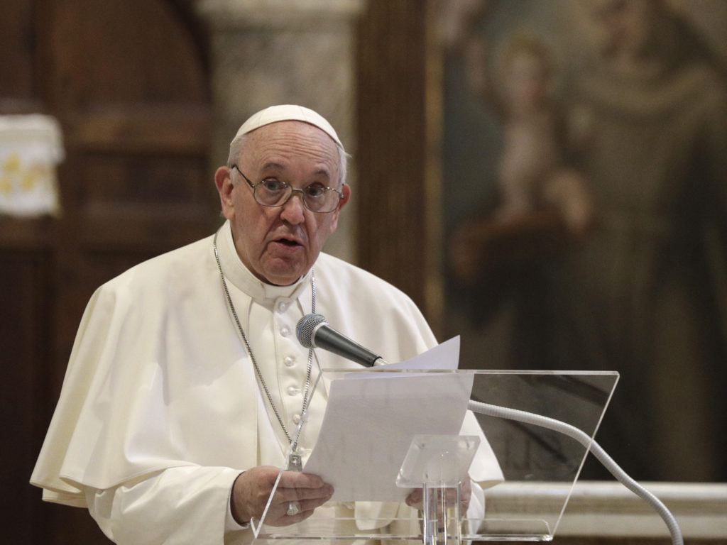 Pope Francis attends a inter-religious ceremony for peace in the Basilica of Santa Maria in Aracoeli, in Rome, on Tuesday. Gregorio Borgia/AP