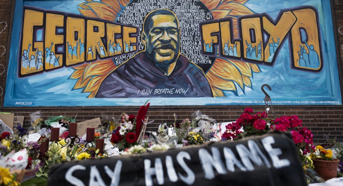 A memorial stands where George Floyd was killed in Minneapolis on May 25 while in police custody. CREDIT: Stephen Maturen/Getty Images