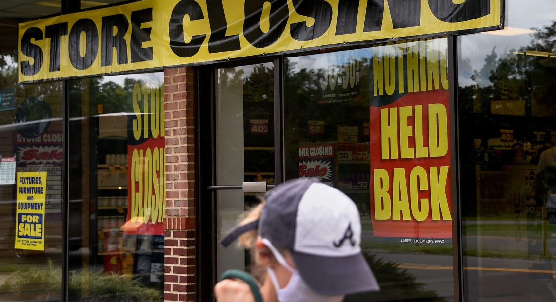 A store displays a sign before closing down permanently following the impact of the coronavirus pandemic, on Aug. 4, 2020 in Arlington, Va. The Small Business Administration's inspector general office said billions of dollars in relief loans may have been handed out to fraudsters or ineligible applicants. CREDIT: Olivier Douliery/AFP via Getty Images