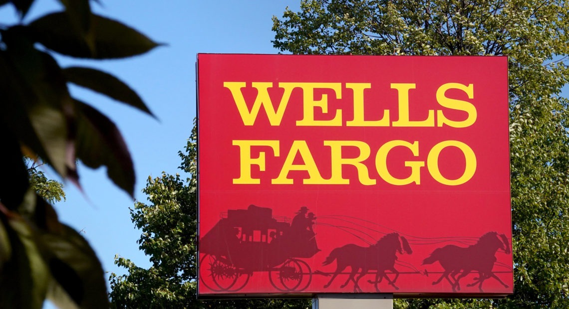 Wells Fargo has fired more than 100 employees whom it says personally defrauded a pandemic relief program from the Small Business Administration. CREDIT: Scott Olson/Getty Images