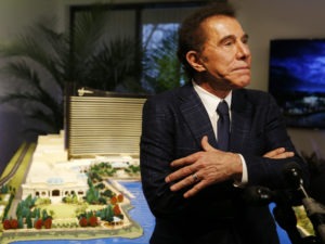 Steve Wynn speaks to reporters in Massachusetts in 2016, when he still led Wynn Resorts. In 2018, Wynn stepped down from the company after a series of allegations of sexual misconduct, including one allegation of rape. Wynn has denied any wrongdoing. CREDIT: Jessica Rinaldi/Boston Globe via Getty Images