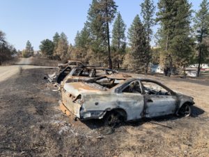 Burned cars from a wildfire that destroyed most of the eastern Washington town of Malden on Labor Day. Kirk Siegler/NPR