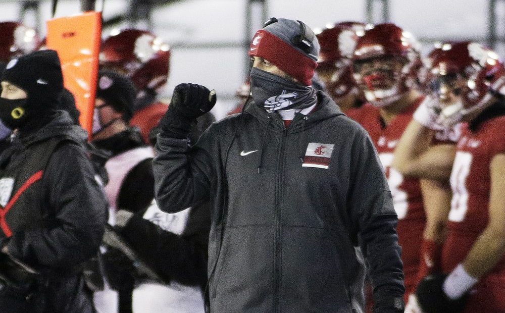 Washington State University coach Nick Rolovich walks along the sideline during the first half of the team's football game against Oregon in Pullman, Wash., Nov. 14, 2020. CREDIT: Young Kwak/AP