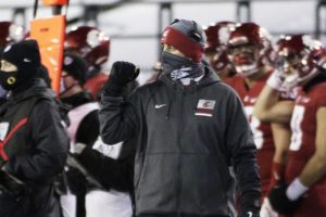 Washington State University coach Nick Rolovich walks along the sideline during the first half of the team's football game against Oregon in Pullman, Wash., Nov. 14, 2020. CREDIT: Young Kwak/AP